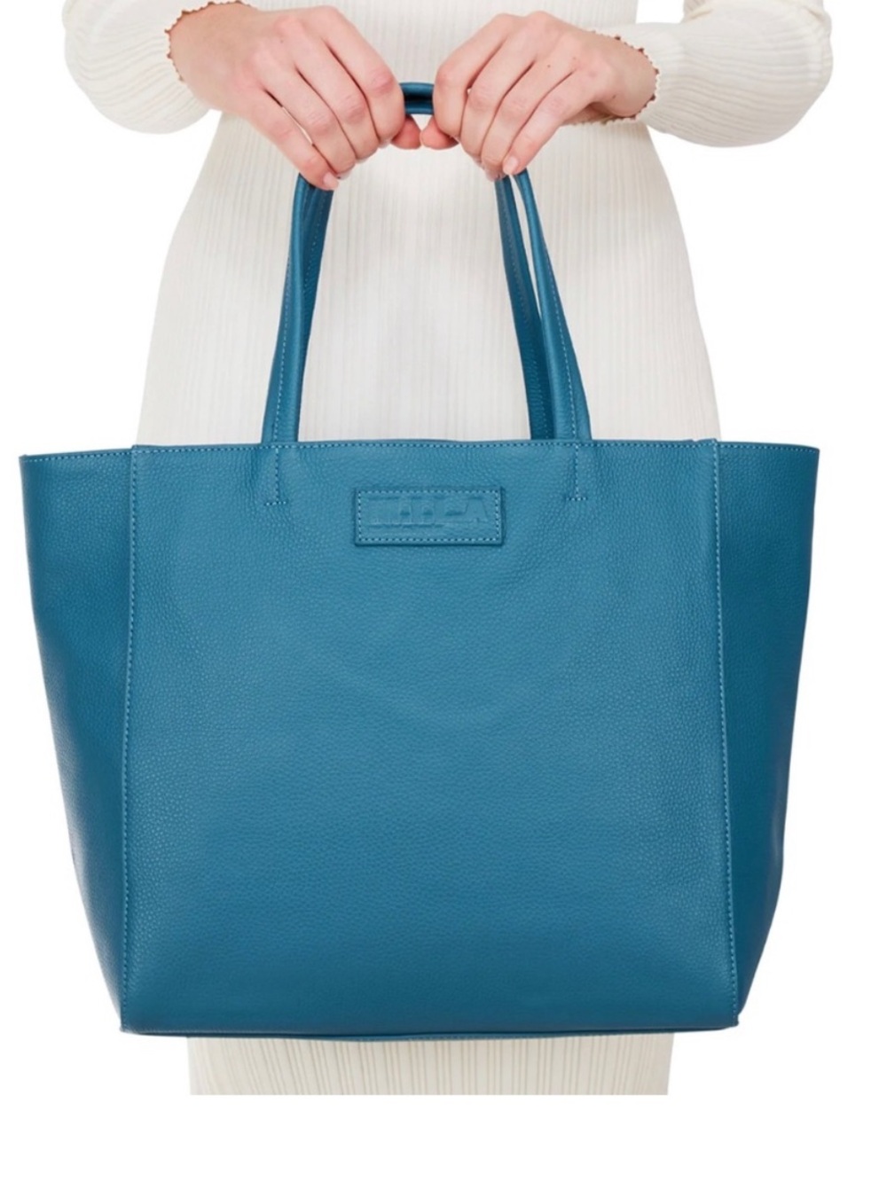 M. I. L. A leather tote bag